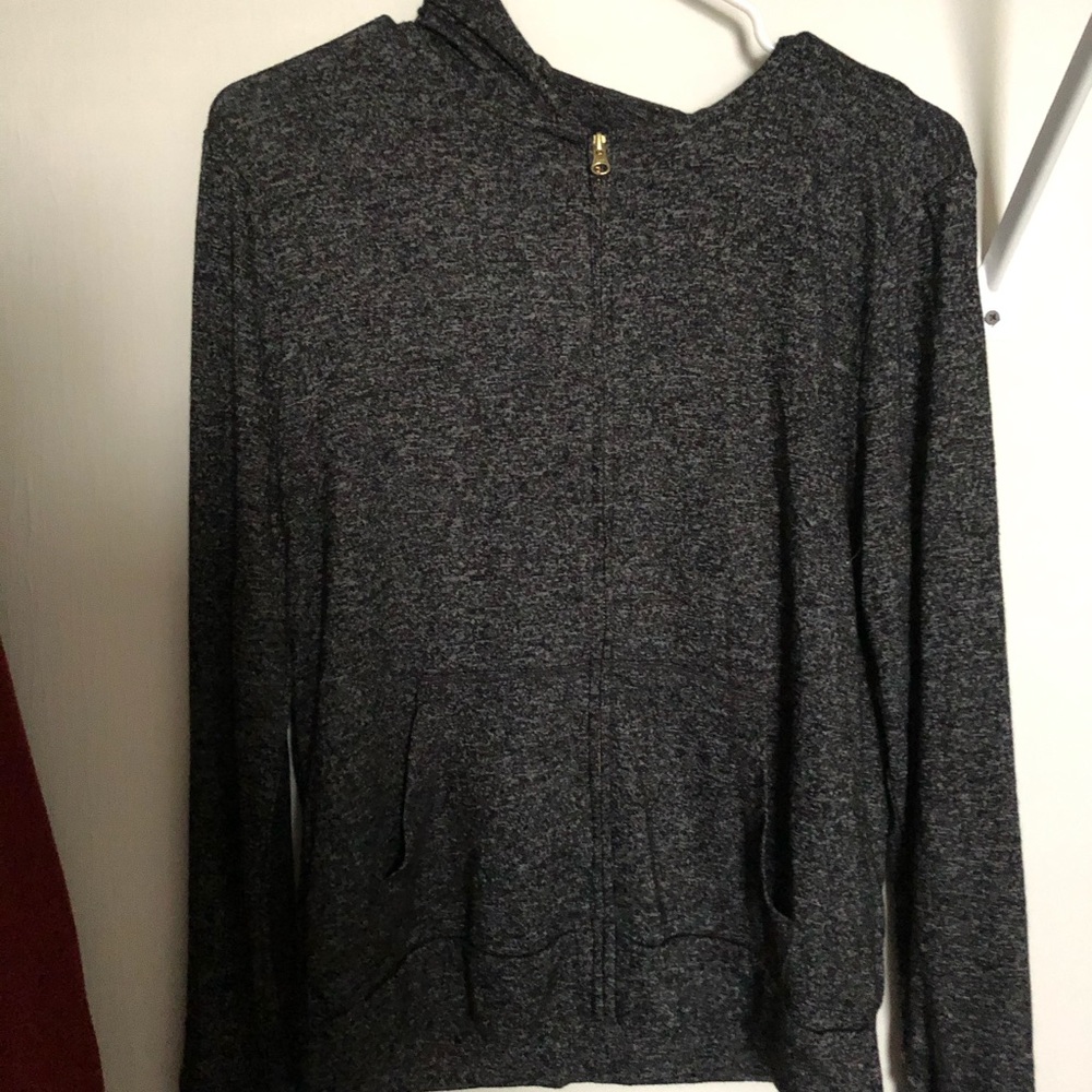 Dark gray women’s jacket with gold zipper